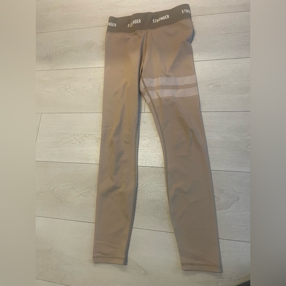 Running leggings with left thigh details, size medium. - Picture 4 of 4